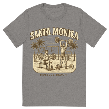 Front view of a Premium Tri-Blend Crew Neck T-Shirt in Grey showing 'A typographic, nostalgic graphic of a typographic illustration of the words 'santa monica' with a vintage line art drawing of muscle beach'