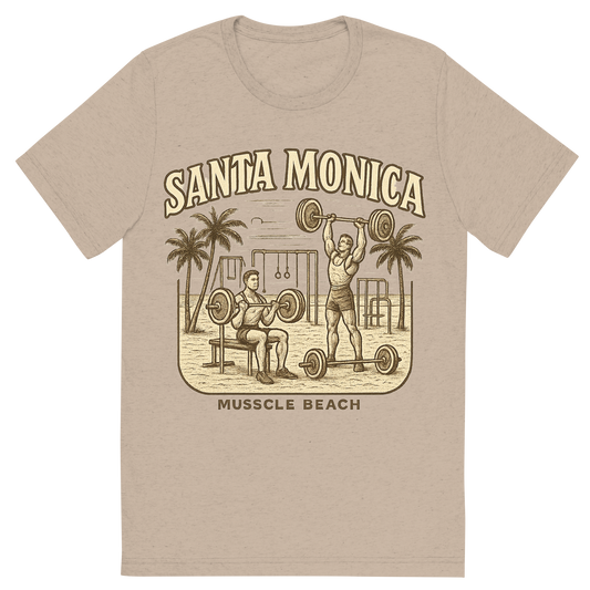 Front view of a Premium Tri-Blend Crew Neck T-Shirt in Tan showing 'A typographic, nostalgic graphic of a typographic illustration of the words 'santa monica' with a vintage line art drawing of muscle beach'