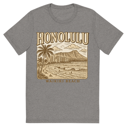 Front view of a Premium Tri-Blend Crew Neck T-Shirt in Grey showing 'A typographic, nostalgic graphic of a typographic illustration of the words 'honolulu' with a vintage line art drawing of waikiki beach'