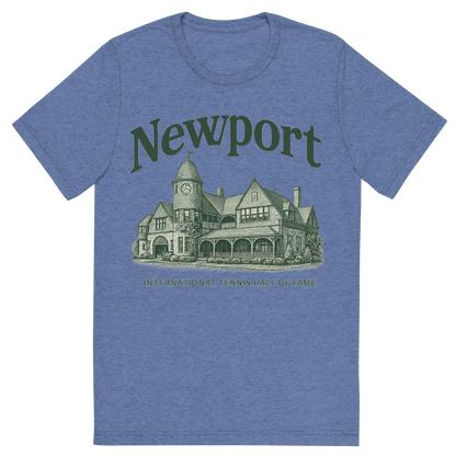 Front view of a Premium Tri-Blend Crew Neck T-Shirt in Blue showing 'A typographic, nostalgic graphic of a typographic illustration of the words 'newport' with a vintage line art drawing of the international tennis hall of fame'