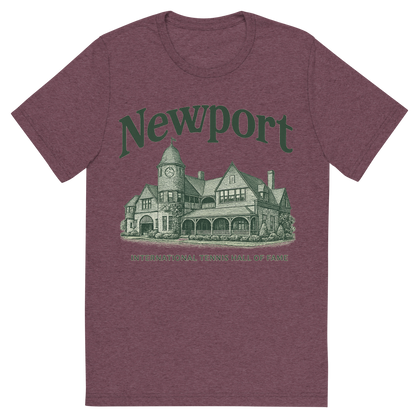 Front view of a Premium Tri-Blend Crew Neck T-Shirt in Maroon showing 'A typographic, nostalgic graphic of a typographic illustration of the words 'newport' with a vintage line art drawing of the international tennis hall of fame'