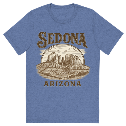 Front view of a Premium Tri-Blend Crew Neck T-Shirt in Blue showing 'A typographic, nostalgic graphic of a typographic illustration of the words 'sedona, arizona' with a vintage line art drawing of the vortex energy sites'