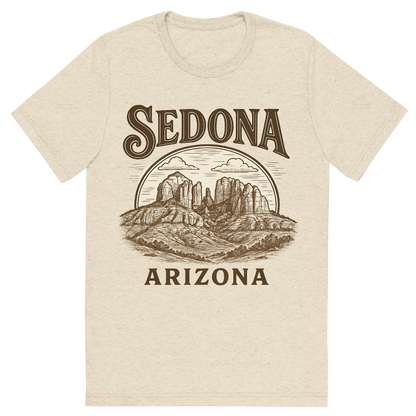 Front view of a Premium Tri-Blend Crew Neck T-Shirt in Oatmeal showing 'A typographic, nostalgic graphic of a typographic illustration of the words 'sedona, arizona' with a vintage line art drawing of the vortex energy sites'