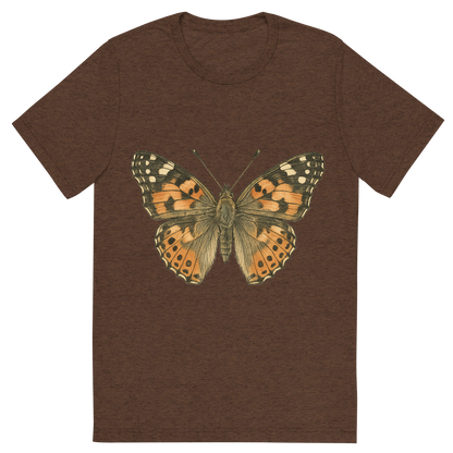 Front view of a Premium Tri-Blend Crew Neck T-Shirt in Brown showing 'A hand-drawn, tranquil graphic of painted lady butterfly'