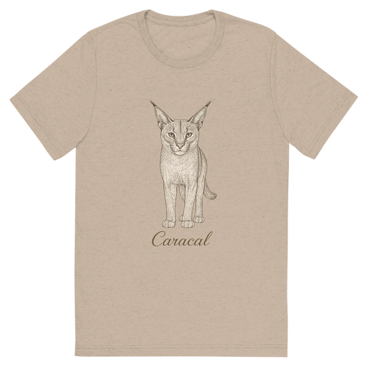 Front view of a Premium Tri-Blend Crew Neck T-Shirt in Tan showing 'A flat, neutral graphic of a fine-line sketch of a caracal with large ears and long legs. “caracal” is inscribed in graceful script beneath. detailed ink illustration on a white background.'