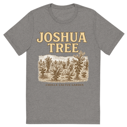 Front view of a Premium Tri-Blend Crew Neck T-Shirt in Grey showing 'A typographic, nostalgic graphic of a typographic illustration of the words 'joshua tree' with a vintage line art drawing of the cholla cactus garden'