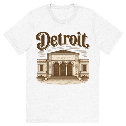Front view of a Premium Tri-Blend Crew Neck T-Shirt in Solid White showing 'A typographic, nostalgic graphic of a typographic illustration of the words 'detroit' with a vintage line art drawing of the detroit institute of arts'