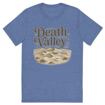 Front view of a Premium Tri-Blend Crew Neck T-Shirt in Blue showing 'A typographic, nostalgic graphic of a typographic illustration of the words 'death valley' with a vintage line art drawing of the mesquite flat sand dunes'