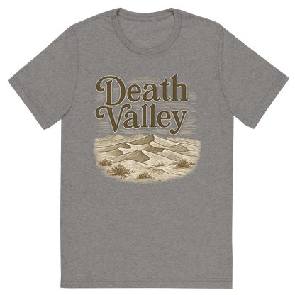Front view of a Premium Tri-Blend Crew Neck T-Shirt in Grey showing 'A typographic, nostalgic graphic of a typographic illustration of the words 'death valley' with a vintage line art drawing of the mesquite flat sand dunes'