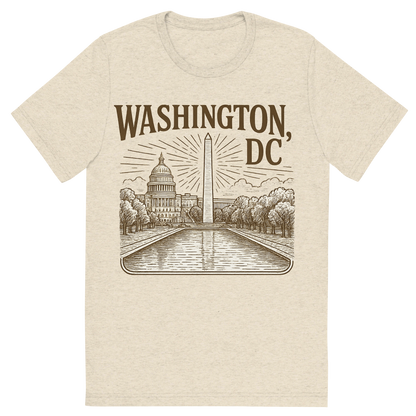 Front view of a Premium Tri-Blend Crew Neck T-Shirt in Oatmeal showing 'A typographic, nostalgic graphic of a typographic illustration of the words 'washington, dc' with a vintage line art drawing of the national mall'