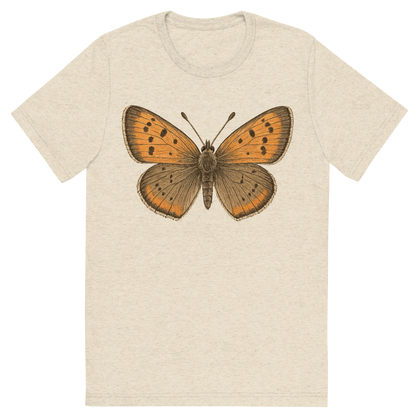 Front view of a Premium Tri-Blend Crew Neck T-Shirt in Oatmeal showing 'A hand-drawn, tranquil graphic of american copper butterfly'