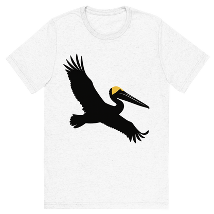 Front view of a Premium Tri-Blend Crew Neck T-Shirt in Solid White showing 'A high-contrast silhouette with minimal accent color, majestic graphic of a large silhouette of a brown pelican gliding with wings stretched and pouch visible, yellow crown highlighted in color, transparent background, optimized for dtg printing'