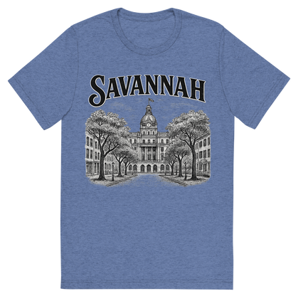 Front view of a Premium Tri-Blend Crew Neck T-Shirt in Blue showing 'A typographic, nostalgic graphic of a typographic illustration of the words 'savannah' with a vintage line art drawing of the historic district'