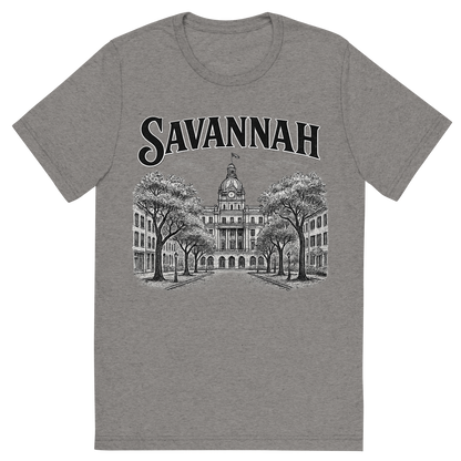 Front view of a Premium Tri-Blend Crew Neck T-Shirt in Grey showing 'A typographic, nostalgic graphic of a typographic illustration of the words 'savannah' with a vintage line art drawing of the historic district'