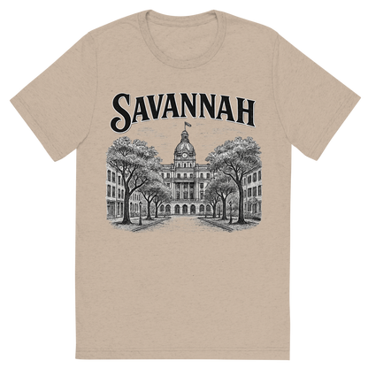 Front view of a Premium Tri-Blend Crew Neck T-Shirt in Tan showing 'A typographic, nostalgic graphic of a typographic illustration of the words 'savannah' with a vintage line art drawing of the historic district'