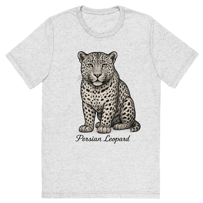 Front view of a Premium Tri-Blend Crew Neck T-Shirt in White Fleck showing 'A flat, neutral graphic of a fine illustration of a persian leopard with wide head and dense spots. “persian leopard” appears below in graceful cursive. detailed ink illustration on a white background.'