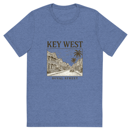 Front view of a Premium Tri-Blend Crew Neck T-Shirt in Blue showing 'A typographic, nostalgic graphic of a typographic illustration of the words 'key west' with a vintage line art drawing of duval street'