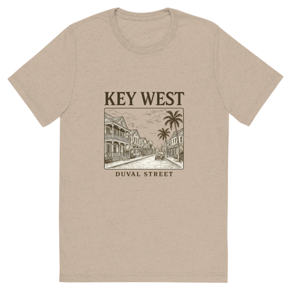Front view of a Premium Tri-Blend Crew Neck T-Shirt in Tan showing 'A typographic, nostalgic graphic of a typographic illustration of the words 'key west' with a vintage line art drawing of duval street'