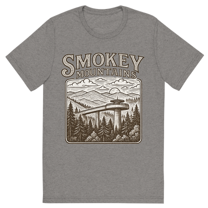 Front view of a Premium Tri-Blend Crew Neck T-Shirt in Grey showing 'A typographic, nostalgic graphic of a typographic illustration of the words 'smokey mountains' with a vintage line art drawing of clingmans dome'