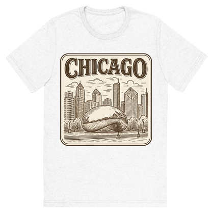 Front view of a Premium Tri-Blend Crew Neck T-Shirt in Solid White showing 'A typographic, nostalgic graphic of a typographic illustration of the words 'chicago' with a vintage line art drawing of millennium park'