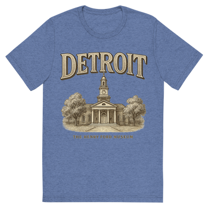 Front view of a Premium Tri-Blend Crew Neck T-Shirt in Blue showing 'A typographic, nostalgic graphic of a typographic illustration of the words 'detroit' with a vintage line art drawing of the the henry ford museum'