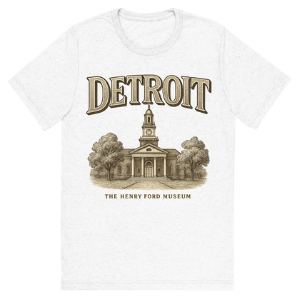 Front view of a Premium Tri-Blend Crew Neck T-Shirt in Solid White showing 'A typographic, nostalgic graphic of a typographic illustration of the words 'detroit' with a vintage line art drawing of the the henry ford museum'
