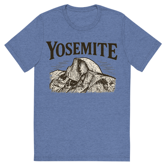 Front view of a Premium Tri-Blend Crew Neck T-Shirt in Blue showing 'A typographic, nostalgic graphic of a typographic illustration of the words 'yosemite' with a vintage line art drawing of the half dome'