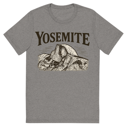 Front view of a Premium Tri-Blend Crew Neck T-Shirt in Grey showing 'A typographic, nostalgic graphic of a typographic illustration of the words 'yosemite' with a vintage line art drawing of the half dome'