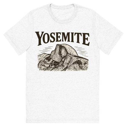 Front view of a Premium Tri-Blend Crew Neck T-Shirt in Solid White showing 'A typographic, nostalgic graphic of a typographic illustration of the words 'yosemite' with a vintage line art drawing of the half dome'
