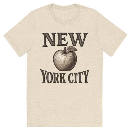 Front view of a Premium Tri-Blend Crew Neck T-Shirt in Oatmeal showing 'A typographic, nostalgic graphic of a typographic illustration of the words 'new york city' with a vintage line art drawing of an apple'