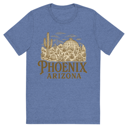 Front view of a Premium Tri-Blend Crew Neck T-Shirt in Blue showing 'A typographic, nostalgic graphic of a typographic illustration of the words 'phoenix, arizona' with a vintage line art drawing of the desert botanical garden'