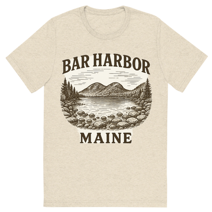 Front view of a Premium Tri-Blend Crew Neck T-Shirt in Oatmeal showing 'A typographic, nostalgic graphic of a typographic illustration of the words 'bar harbor, maine' with a vintage line art drawing of jordan pond'