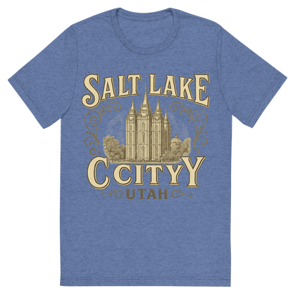 Front view of a Premium Tri-Blend Crew Neck T-Shirt in Blue showing 'A typographic, nostalgic graphic of a typographic illustration of the words 'salt lake city, utah' with a vintage line art drawing of the temple square'