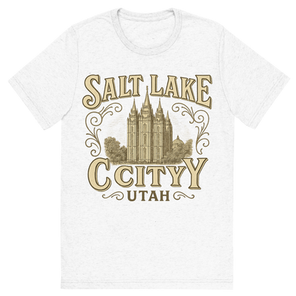 Front view of a Premium Tri-Blend Crew Neck T-Shirt in Solid White showing 'A typographic, nostalgic graphic of a typographic illustration of the words 'salt lake city, utah' with a vintage line art drawing of the temple square'