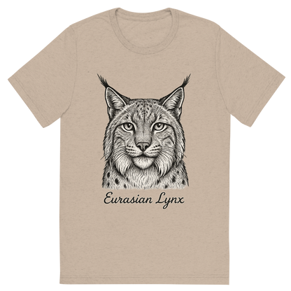 Front view of a Premium Tri-Blend Crew Neck T-Shirt in Tan showing 'A flat, neutral graphic of a detailed sketch of a eurasian lynx with bushy cheeks and tufted ears. “eurasian lynx” is inscribed below in elegant handwriting. detailed ink illustration on a white background.'