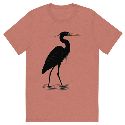 Front view of a Premium Tri-Blend Crew Neck T-Shirt in Mauve showing 'A high-contrast silhouette with minimal accent color, graceful graphic of a tall silhouette of a great blue heron wading in shallow water, with subtle color on the beak and eye, long legs and neck featured, transparent background, optimized for dtg printing'