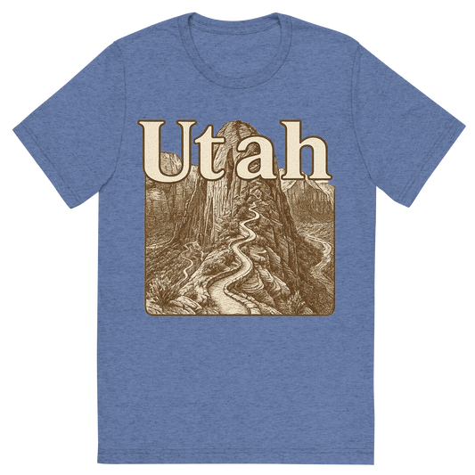 Front view of a Premium Tri-Blend Crew Neck T-Shirt in Blue showing 'A typographic, nostalgic graphic of a typographic illustration of the words 'utah' with a vintage line art drawing of the angels landing trail'
