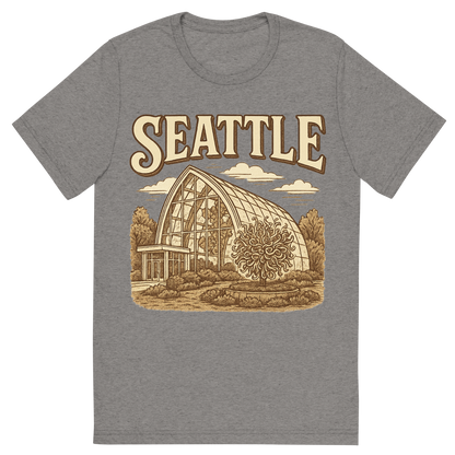 Front view of a Premium Tri-Blend Crew Neck T-Shirt in Grey showing 'A typographic, nostalgic graphic of a typographic illustration of the words 'seattle' with a vintage line art drawing of the chihuly garden and glass'