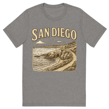 Front view of a Premium Tri-Blend Crew Neck T-Shirt in Grey showing 'A typographic, nostalgic graphic of a typographic illustration of the words 'san diego' with a vintage line art drawing of the la jolla cove'