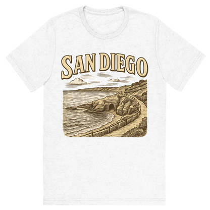 Front view of a Premium Tri-Blend Crew Neck T-Shirt in Solid White showing 'A typographic, nostalgic graphic of a typographic illustration of the words 'san diego' with a vintage line art drawing of the la jolla cove'