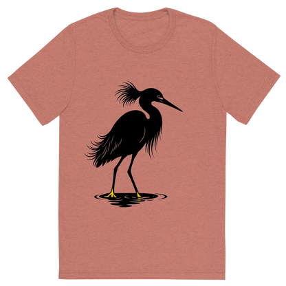 Front view of a Premium Tri-Blend Crew Neck T-Shirt in Mauve showing 'A high-contrast silhouette with minimal accent color, elegant graphic of a high-contrast silhouette of a snowy egret with plume feathers and slender black bill, yellow feet highlighted in color, standing in water, transparent background, optimized for dtg printing'