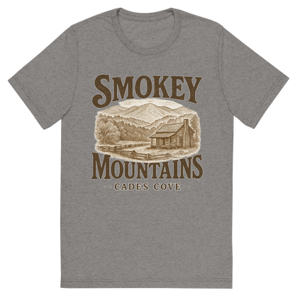Front view of a Premium Tri-Blend Crew Neck T-Shirt in Grey showing 'A typographic, nostalgic graphic of a typographic illustration of words 'smokey mountains' with a vintage line art drawing of the cades cove'