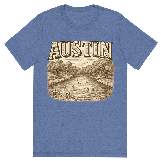 Front view of a Premium Tri-Blend Crew Neck T-Shirt in Blue showing 'A typographic, nostalgic graphic of a typographic illustration of the words 'austin' with a vintage line art drawing of the barton springs pool'