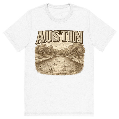Front view of a Premium Tri-Blend Crew Neck T-Shirt in Solid White showing 'A typographic, nostalgic graphic of a typographic illustration of the words 'austin' with a vintage line art drawing of the barton springs pool'