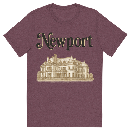 Front view of a Premium Tri-Blend Crew Neck T-Shirt in Maroon showing 'A typographic, nostalgic graphic of a typographic illustration of the words 'newport' with a vintage line art drawing of the gilded age mansions'