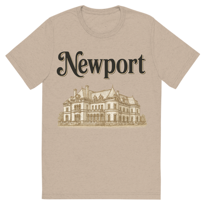 Front view of a Premium Tri-Blend Crew Neck T-Shirt in Tan showing 'A typographic, nostalgic graphic of a typographic illustration of the words 'newport' with a vintage line art drawing of the gilded age mansions'