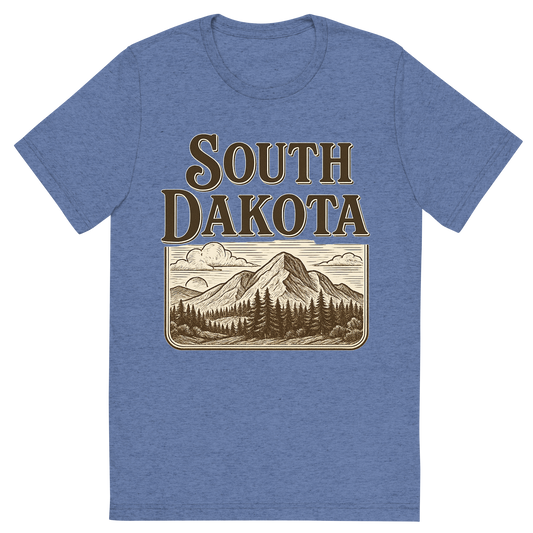 Front view of a Premium Tri-Blend Crew Neck T-Shirt in Blue showing 'A typographic, nostalgic graphic of a typographic illustration of the words 'south dakota' with a vintage line art drawing of the black hills'