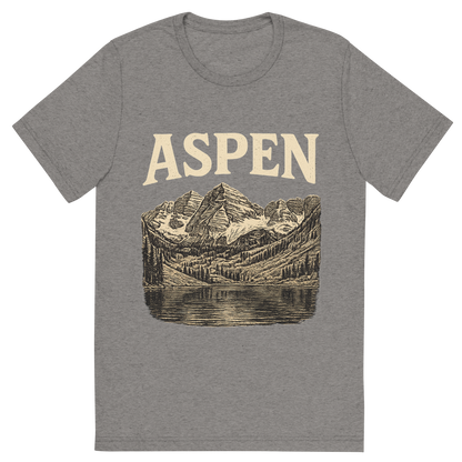 Front view of a Premium Tri-Blend Crew Neck T-Shirt in Grey showing 'A typographic, nostalgic graphic of a typographic illustration of the words 'aspen' with a vintage line art drawing of the maroon bells'