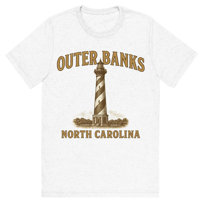 Front view of a Premium Tri-Blend Crew Neck T-Shirt in Solid White showing 'A typographic, nostalgic graphic of a typographic illustration of the words 'outer banks, north carolina' with a vintage line art drawing of the cape hatteras lighthouse'
