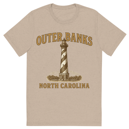 Front view of a Premium Tri-Blend Crew Neck T-Shirt in Tan showing 'A typographic, nostalgic graphic of a typographic illustration of the words 'outer banks, north carolina' with a vintage line art drawing of the cape hatteras lighthouse'